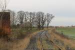 Die Strecke Lengerich-Gtersloh der Teutoburgerwaldeisenbahn bei Zum Wasserfall (Lienen) in die Richtung Lengerich am 28-12-2012.