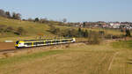 5-teiliger Flirt als MEX 16 Ulm-Stuttgart am 08.03.2022 bei Uhingen aufgenommen von der Nassachtalbrücke. 