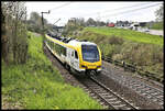 GoAhead ET 5.02 ist hier an dem bekannten Fotopunkt Ziegelhütte am 3.5.2023 um 11.00 Uhr auf Talfahrt auf der Geislinger Steige.