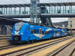 ET 2463 012-1 mit dem RE 9 nach München in Ulm Hbf, 06.01.2023.