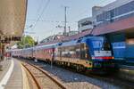 MRCE 182 519/ES 64 U2-019 mit Urlaubsexpress in Düsseldorf Hbf, Juli 2018.