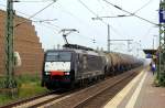 ES 64 F4 - 113 alias 189-113 der MRCE durchfährt am 26.07.2014 mit einem Kesselwagenzug den S-Bahn-Haltepunkt Neuss-Allerheiligen