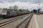 189 281 (ES 64 F4-281) mit leeren Flachwagen in München-Trudering.