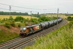 HSL 187 538 mit Kesselzug in Ovelgünne, Juni 2023.