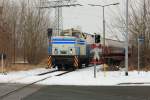 345 268-7 der Industrietransportgesellschaft mbH Brandenburg (ITB) steht am 14. Februar 2012 in Brandburg am unbeschrankten Bahnbergang Spitastrasse.