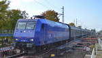 Leasinglok von SRI Rail Invest GmbH [D]  145 087-3  [NVR-Nummer: 91 80 6145 087-3 D-SRI], der aktuelle Mieter ist LOCON , mit einem gemischten Güterzug (Schiebewandwagen + Container) am 09.10.19 Berlin Karow Richtung Nordosten.