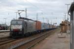 Locon ES 64 F4-084 (E 189-984)am 15.07.2011 mit einem Containerzug durch Grokorbetha 