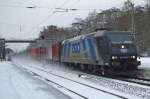 185 546-9 kmpft sich durch den, bei wetter.com angesagten  leichten Schneefall , in Fahrtrichtung Norden durch Eichenberg. Aufgenommen am 13.02.2010.