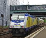 246 006-1 mit ihrem Zug in Richtung Cuxhaven verlsst den Bahnhof Hamburg-Harburg.