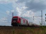 270 082 (ER20) fhrt am 30.07.13 mit leeren Holzwagen aus Richtung Seelze nach Wunstorf. 
Eingefangen kurz vor Dedensen-Gmmer. 