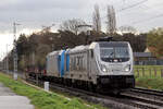 Rpool 187 006-2 mit ATLU 185 515-4 auf der Hamm-Osterfelder Strecke am BÜ km 66,7 Kerstheiderstr. 13.4.2023