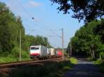 Am 31.5.14 schoss E186 240 mit einem Containerzug durch Hämelerwald richtung Osten. 