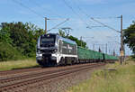 Mit einem langen Hochbordwagenzug am Haken rollte 159 212 der SBW am 09.06.24 durch Greppin Richtung Dessau.