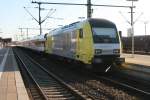 Dispolok ER20-011 schiebt einen NOB Reisezug aus Westerland nach Hamburg Altona.Itzehoe 08.03.2011.