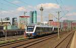 Auf dem Weg nach Kleve passiert VT 648 436 der NordWestBahn am 04.08.2013 den S-Bahn-Haltepunkt Düsseldorf Hamm, im Hintergrund die Düsseldorfer Hafen-City