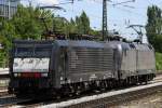 Ein TXL Lokzug mit 189 992-1 und ES 62 U2 - 029 fahren durch Mnchen Heimeranplatz am 18.07.2012