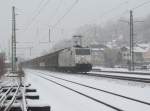 185 539-4 der TX Logistik zieht am 16. Februar 2013 einen H-Wagenzug durch Kronach.