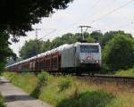 185 538-6 der TX Logistik mit offenen ARS-Autotransportwagen in Fahrtrichtung Norden. Aufgenommen am 22.07.2014 bei Eystrup.