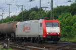 185-CL 005 der Veolia schleppt einen Kesselwagenzug quer ber die Nordeinfahrt-Gruppe von Gremberg Gbf Richting Gterumfahrung und weiter Richtung Troisdorf. (19.05.2009).