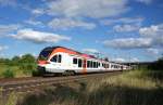 VIAS- Triebzug 409 und ein weiterer VIAS- Triebzug (Stadler Flirt, BR428) unterwegs in Richtung Wiesbaden. (Aufnahmeort: Mainz-Kastel, 31. Juli 2013)