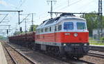 WFL 232 233-5 [NVR-Nummer: 92 80 1233 233-6 D-WFL] mit einem Schotterzug mit Schüttgutkippwagen (leer) am 04.06.19 Golm (Potsdam).