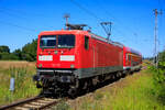 WFL überführte am 11.08.2022 mit 112 131 einen DABuzfa von Mukran nach Neustrelitz.