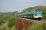 ET 019 und ein kleiner Bruder der Westfalenbahn als RB 61 Osnabrck - Paderborn Hbf kurz hinter Altenbeken, 29.04.2011.