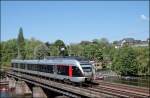 Ein ET23xxx berquert als ABR33813, (RB40  Ruhr-Lenne-Bahn ), den Harkortsee bei Wetter(Ruhr). Aufgenommen am 12.05.2008.