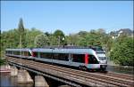 Zwei FLIRT´s der ABELLIO RAIL NRW berqueren als ABR99609, (RE16  Ruhr-Sieg-Express ) den Harkortsee bei Wetter(Ruhr) auf der Fahrt nach Essen Hbf.