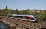 ET23xxx  Hagen  berquert bei Wetter(Ruhr) den Harkortsee als ABR33812 (RB40  Ruhr-Lenne-Bahn ) nach Essen.