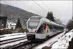 ET23001 durchfhrt als RE16  Ruhr-Sieg-Express  das Dorf Benolpe auf dem Weg nach Essen. (06.12.2008)