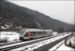 Ein ET22 ist bei Benolpe als RB91  Ruhr-Sieg-Bahn  nach Siegen unterwegs.