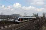 ET23003 und ein ET22 sind als ABR99675 (RE16  Ruhr-Sieg-Express ), Siegen/Iserlohn - Essen Hbf, beim Harkortsee unterwegs.