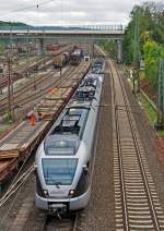 ET 22007 (2-teiliger Stadler Flirt) gekuppelt mit einem 3-teiliger Stadler Flirt (ET 2300?) der Abellio Rail NRW am 15.09.2013 kurz vor dem Bahnhof Kreuztal, hier vor der Langenauer Brcke.