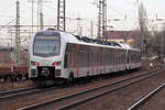 Nachschuss auf Abellio ET 25 2204 mit RE 19 nach Emmerich Umleiter in Duisburg-Bissingheim 4.2.2017