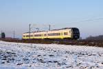 Ein agilis 440.4 war im Sonnenuntergangslicht des 30.01.2011 von Saal (Donau) nach Eggmhl unterwegs.