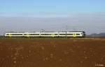 AGILIS 440 602 als ag 84414 Plattling - Neumarkt, KBS 880 Passau - Nrnberg, fotografiert bei Schambach zwischen Strakirchen und Straubing am 16.01.2012 --> rechts im Hintergrund die Wallfahrtskirche