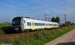 Am 3. August 2001 eilt 440 918 als ag 84307 nach Eggmühl durch die niederbayrische Landschaft bei Köfering.