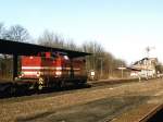 Lok II Red Bull (ex-DR 110 878-6, ex-DB 201 878-6) der Ahaus-Alsttter Eisenbahn GmbH mit einem Gterzug auf Bahnhof Coesfeld am 26-2-2003.