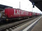 10.12.2015 in Bamberg Hbf in einem KLV-Zug, gleich dahinter: 31 80 4993 064-3 RIV D-AAEC Sdggmrs525, ebenfalls mit Sattelauflieger Spedition Lauritzen.