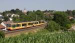 Zusammen mit einem weiteren Stadtbahntriebwagen war Wagen 859 der AVG am 21. Juli 2013 auf dem Weg nach Bad Wildbad, als ich ihn am Maisfeld zu Sachsenheim auf den Chip bannen konnte.