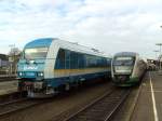 223 068 mit dem ALEX neben dem VT 24 der Vogtlandbahn (beides Arriva) in Weiden i.d.