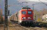 140432 der Bayernbahn mit dem Henkelzug bei Oberlahnstein am 02.03.2022