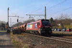 ELP/IGE/BBL 159 254 mit einem Schotterzug von Hannover Linden in Richtung Braunschweig hier bei Hämelerwald.