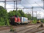 D25 (ehemalige DB 211 345-4) der Bentheimer Eisenbahn AG und 185 686-3 (Railpool Peterson) in die Nhe von Bahnhof Bentheim am 12-7-2012.