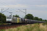 ITL 185 548 und 152 197 mit Getreidezug gen Falkenberg passiert gerade das Eisenbahndreieck bei Zeithain.