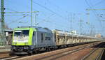 ITL - Eisenbahngesellschaft mbH, Dresden [D] mit  285 118-7  [NVR-Nummer: 92 88 0076 102-7 B-ITL] und Schüttgutwagenzug, am Ende des Zuges war noch  285 117-9  mit dran am 25.02.21 Durchfahrt Bf. Flughafen BER Terminal 5.