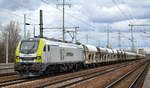 ITL - Eisenbahngesellschaft mbH, Dresden [D] mit  159 103-1  [NVR-Nummer: 90 80 2159 103-1 D-ITL] und Schüttgutwagenzug  am 16.03.21 Durchfahrt Bf. Flughafen BER Terminal 5.