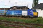 146 519 zieht einen Gterzug durch Halle/S. Die Lok mit der Werbung Der Antrieb des Nordens. 24.07.2007