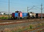 V 133 der Regiobahn Bitterfeld(RBB) zieht am 17.07.06 einen Gterzug  in den Gterbereich des Bahnhofs Bitterfeld.